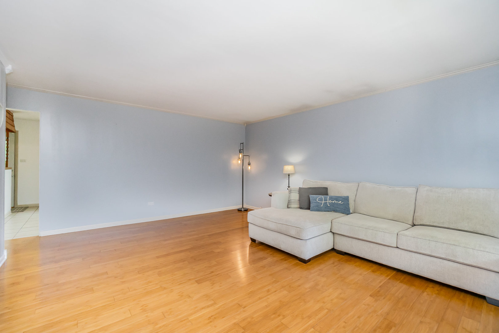 2831 193rd Street Lansing, IL 60438 - Photo 6 of 28 a living room with furniture and a night stand