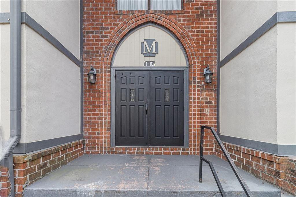 6851 Roswell Road, Unit M5 Atlanta, GA 30328 - Photo 2 of 21 a view of entrance door of the house
