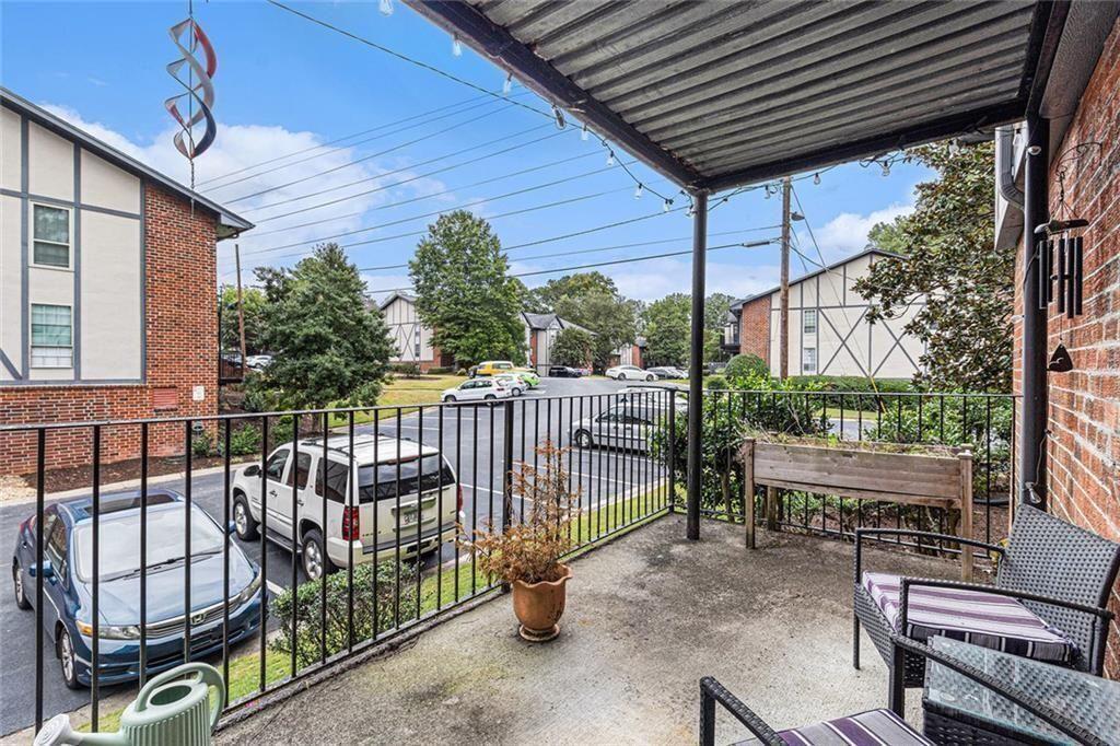 6851 Roswell Road, Unit M5 Atlanta, GA 30328 - Photo 21 of 21 a view of a porch with furniture