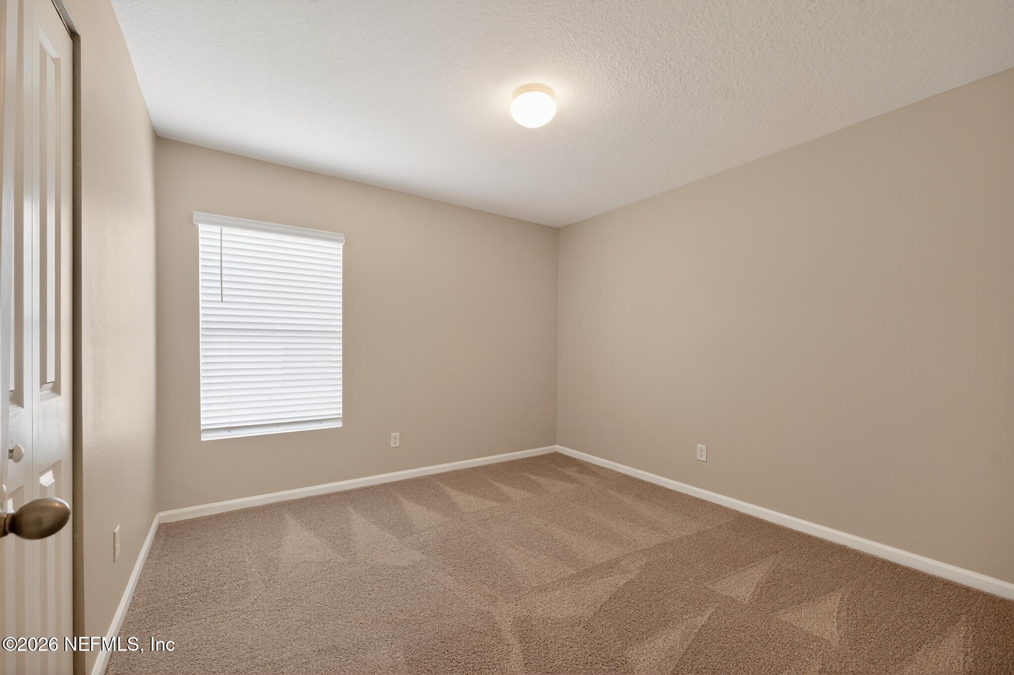 4818 Morning Rise Circle Jacksonville, FL 32218 - Photo 26 of 33 17_4818_Morning_Rise_Cir-Bedroom-8464