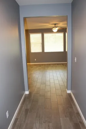 a view of an empty room and window