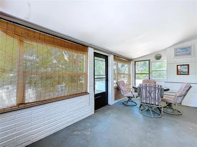 a bathroom with a granite countertop toilet a sink and bathtub