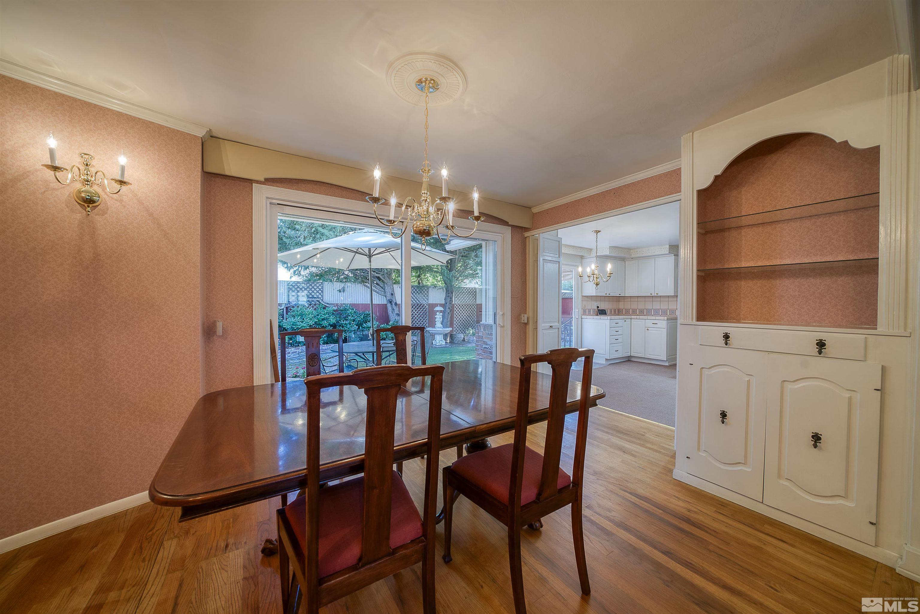1730 West 6th Street Reno, NV 89503 - Photo 11 of 25 a view of a dining room with furniture and chandelier
