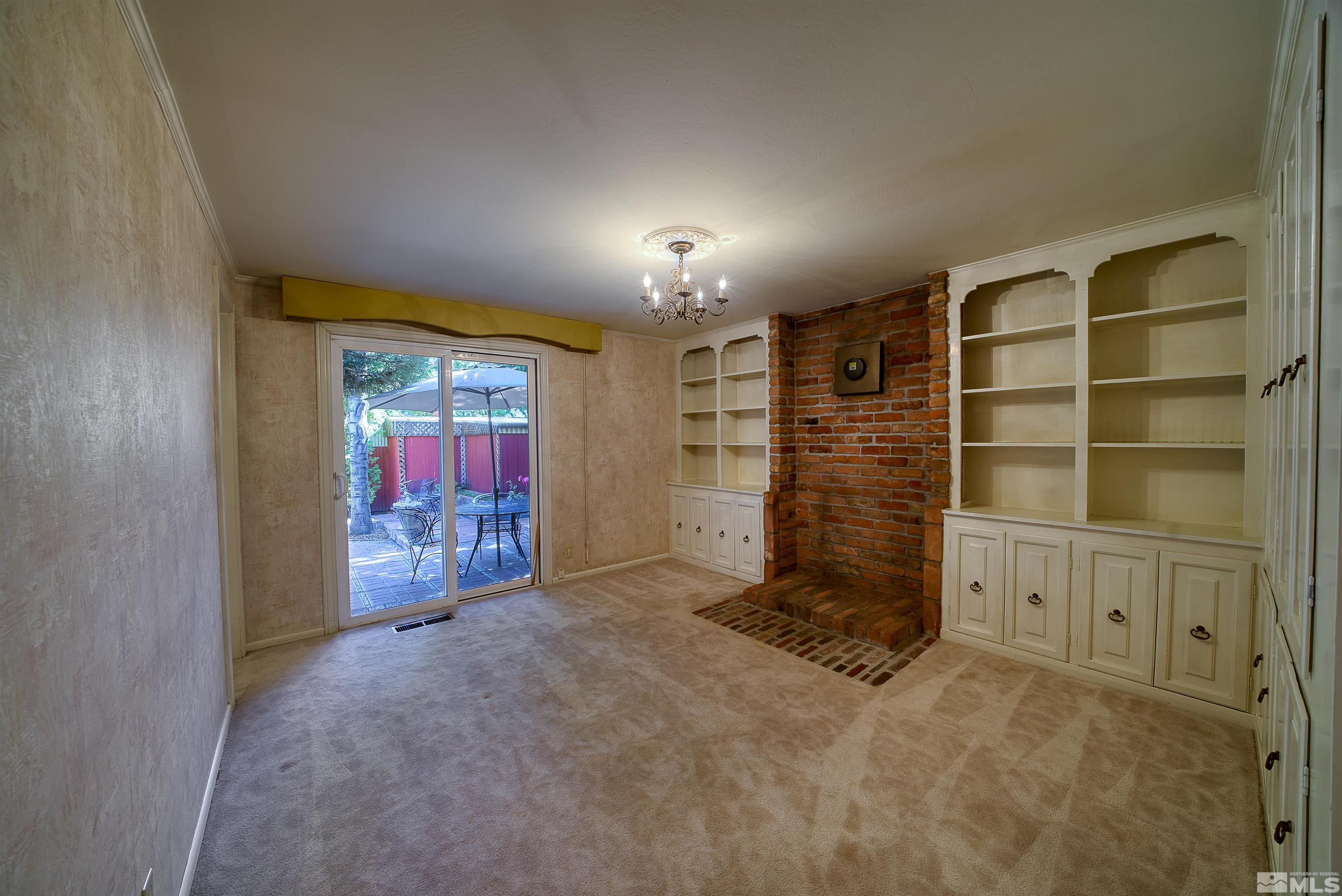1730 West 6th Street Reno, NV 89503 - Photo 19 of 25 a view of an empty room with cabinet and a window