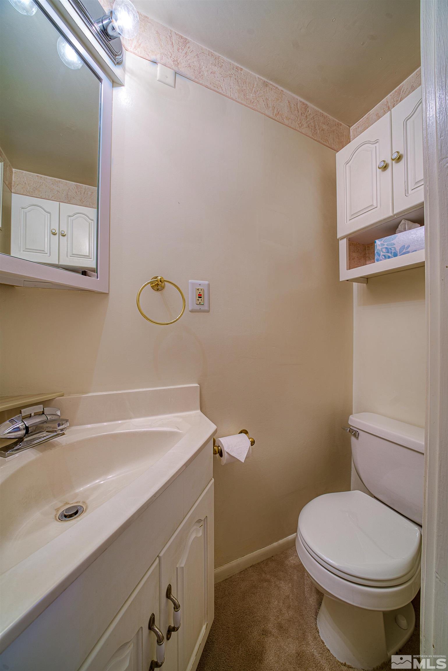 1730 West 6th Street Reno, NV 89503 - Photo 20 of 25 a bathroom with a sink a toilet and shower
