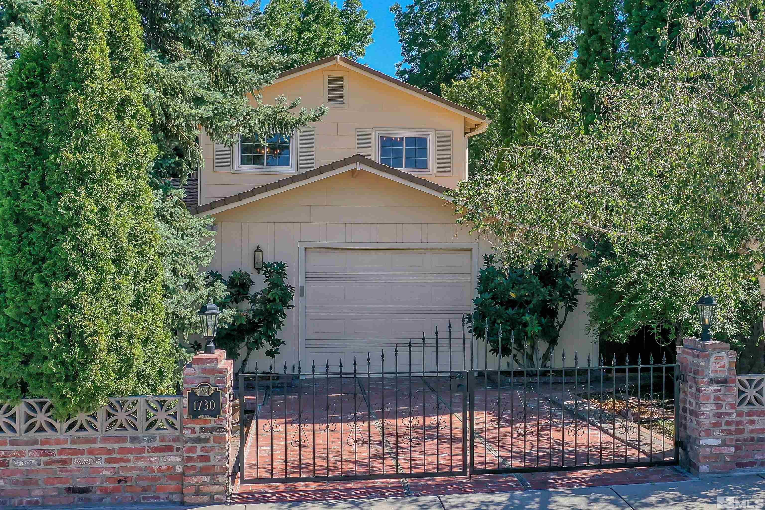 1730 West 6th Street Reno, NV 89503 - Photo 2 of 25 a house that has a tree in front of it