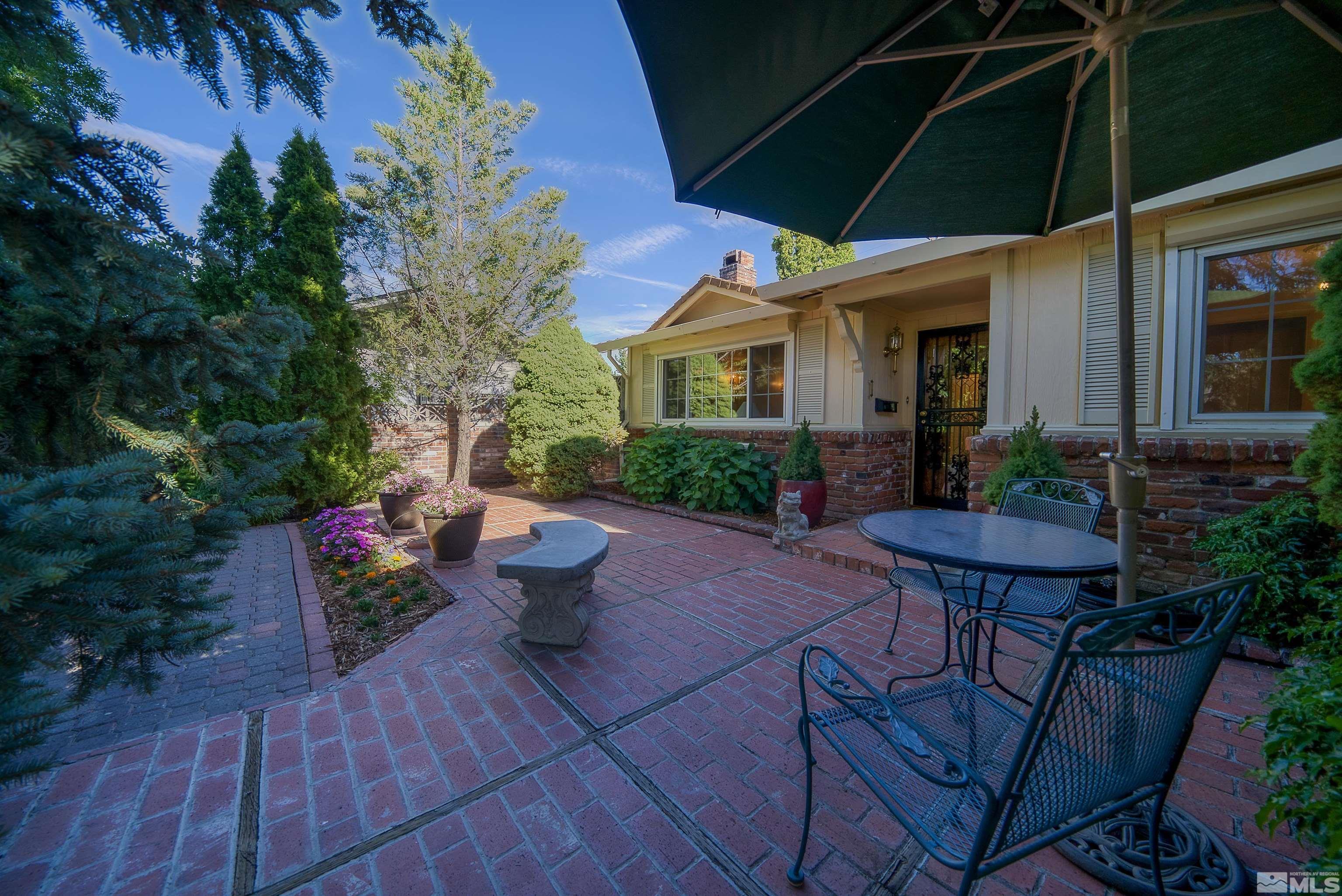 1730 West 6th Street Reno, NV 89503 - Photo 8 of 25 a view of a house with backyard sitting area and garden