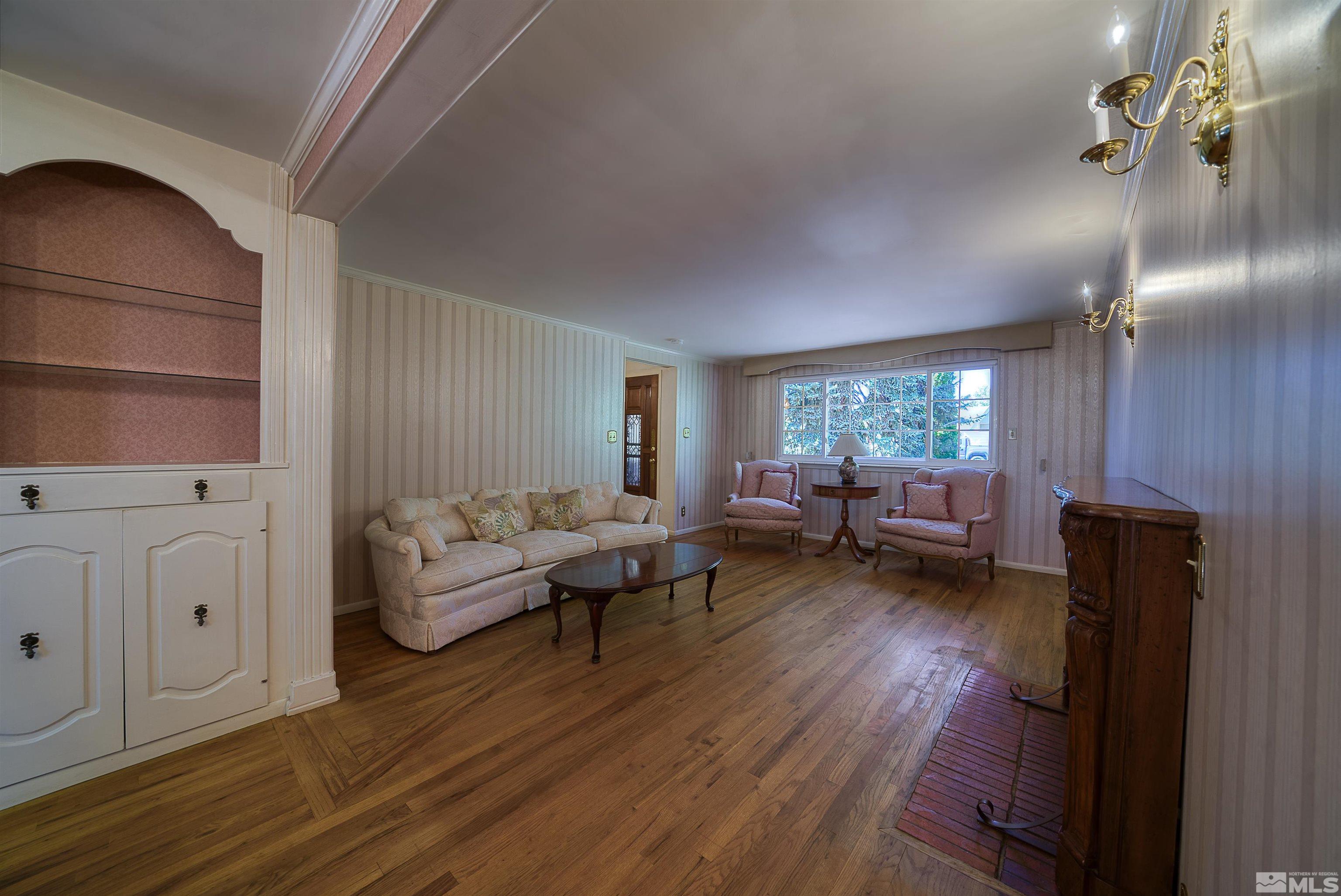 1730 West 6th Street Reno, NV 89503 - Photo 10 of 25 a living room with furniture and a wooden floor