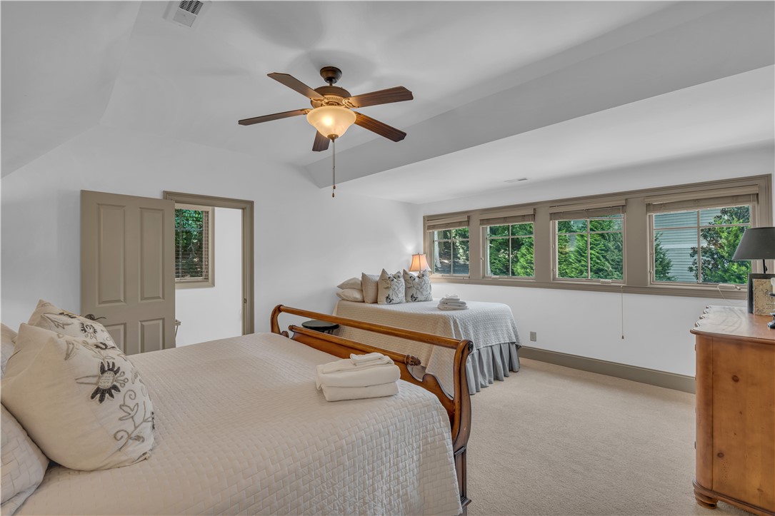 256 Talton Road Six Mile, SC 29682 - Photo 30 of 50 Recessed architectural details and a row of windows highlight this upper-level bedroom retreat.