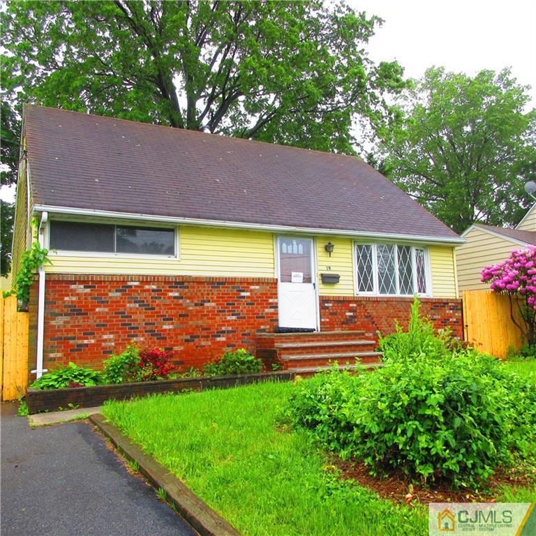 19 North Pennington Road New Brunswick, NJ 08901 - Photo 1 of 10 a front view of a house with garden