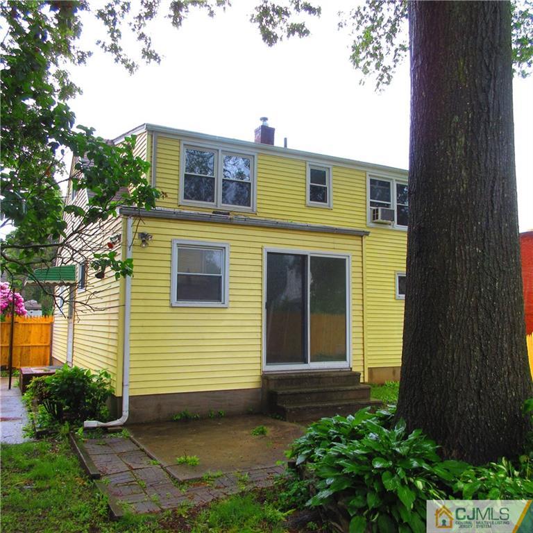 19 North Pennington Road New Brunswick, NJ 08901 - Photo 10 of 10 a front view of a house with a yard