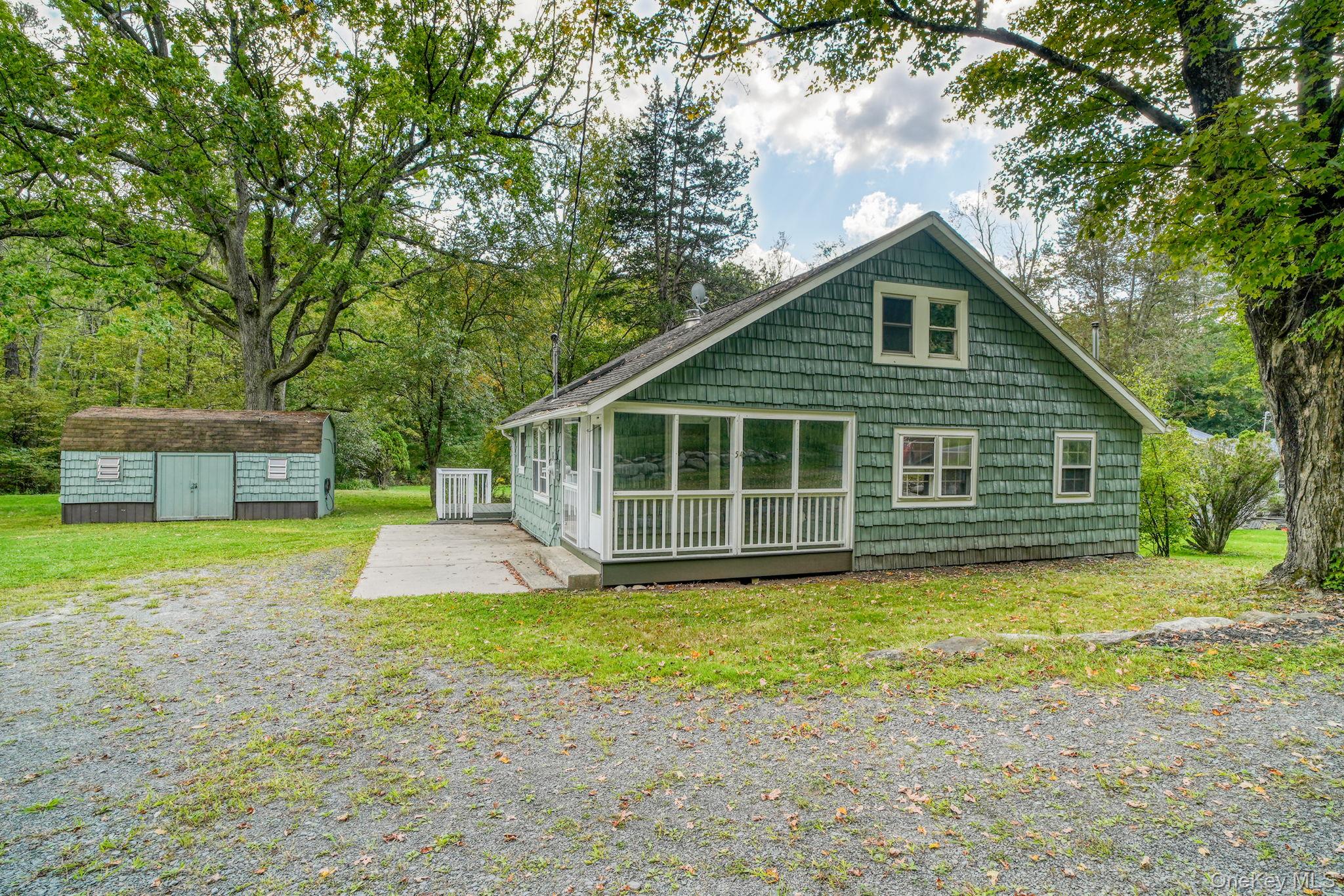 54 Lime Kiln Road Port Jervis, NY 12771 - Photo 1 of 34 a view of a house with a yard