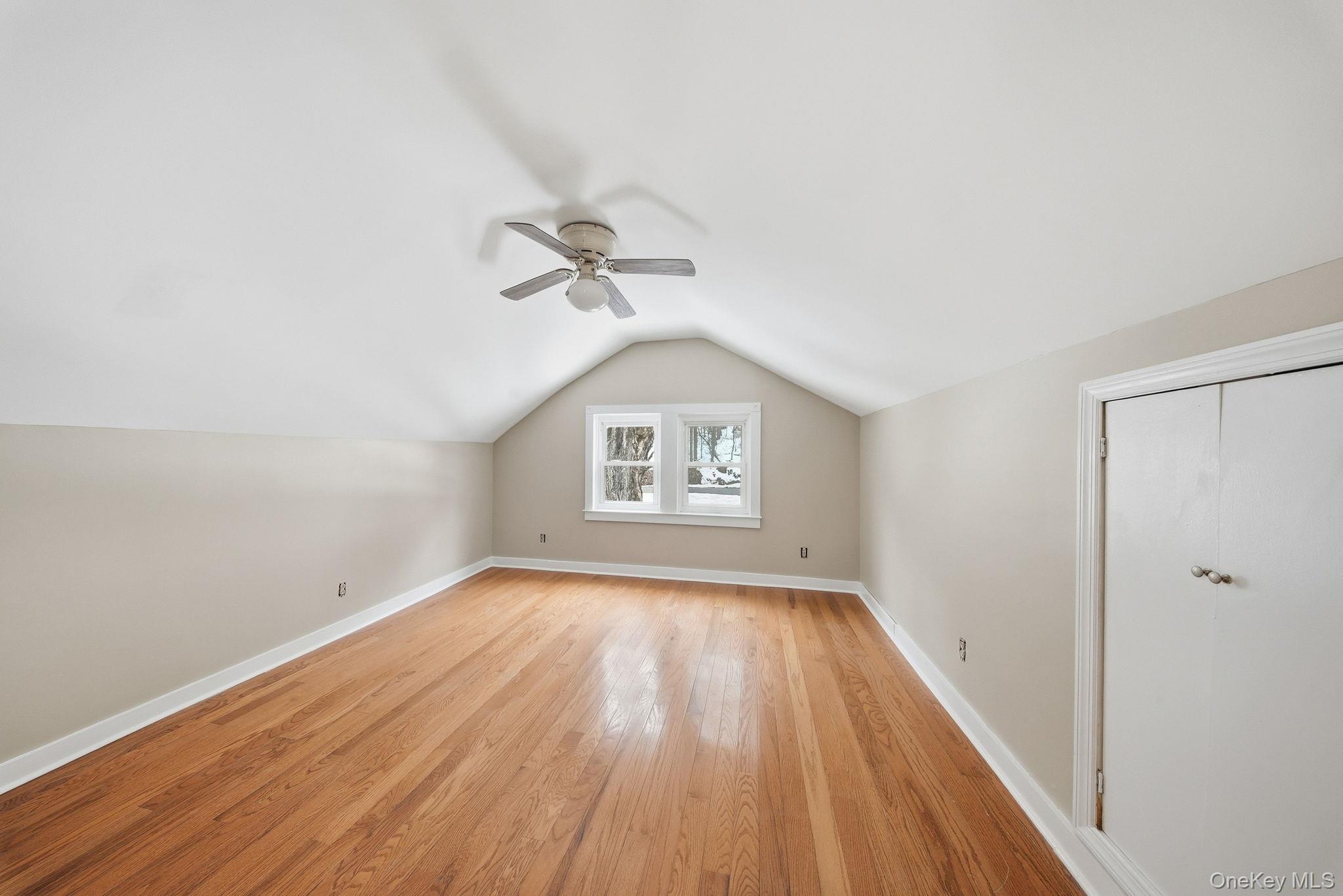 54 Lime Kiln Road Port Jervis, NY 12771 - Photo 11 of 34 wooden floor in an empty room with a window