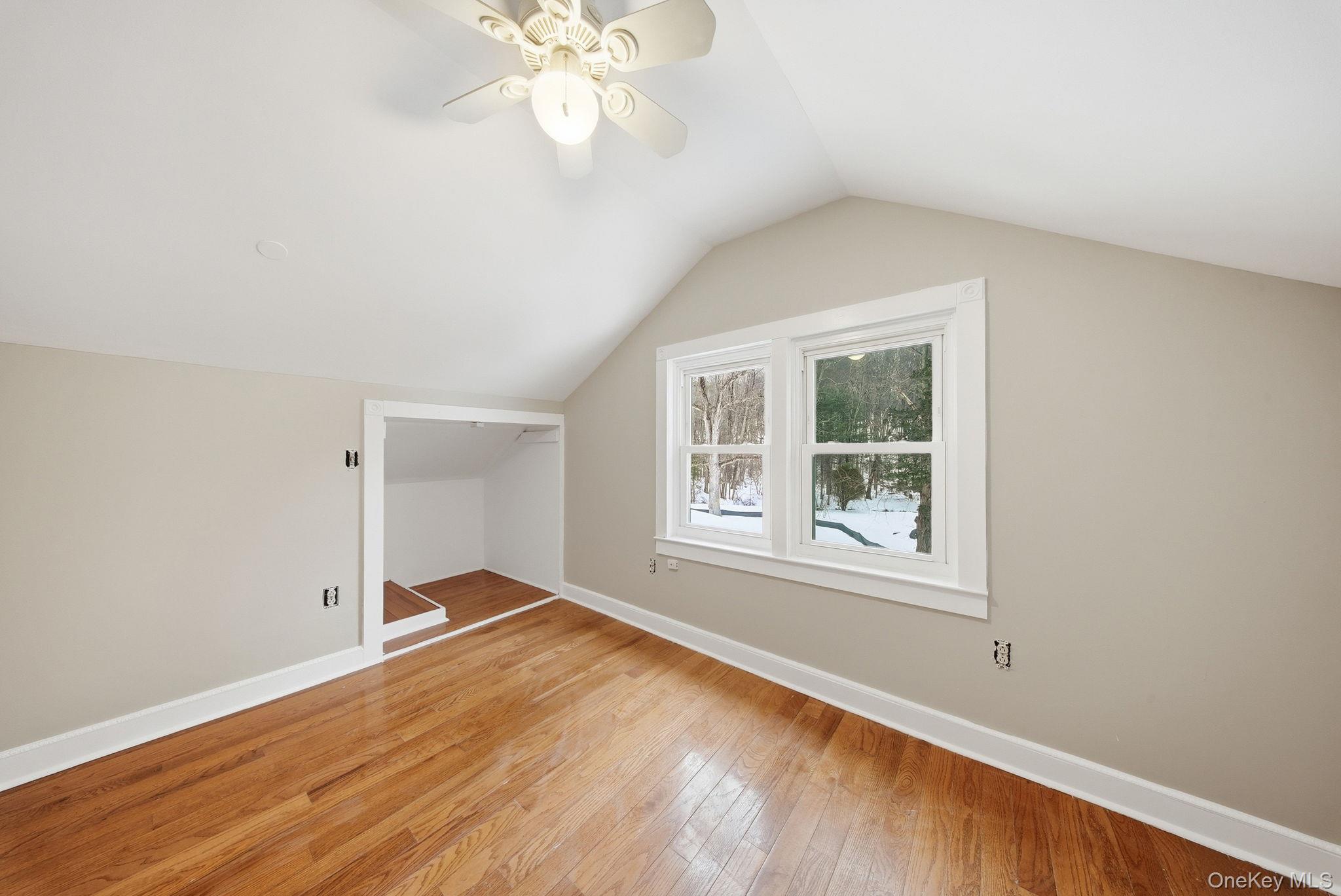 54 Lime Kiln Road Port Jervis, NY 12771 - Photo 16 of 34 wooden floor in an empty room with a window