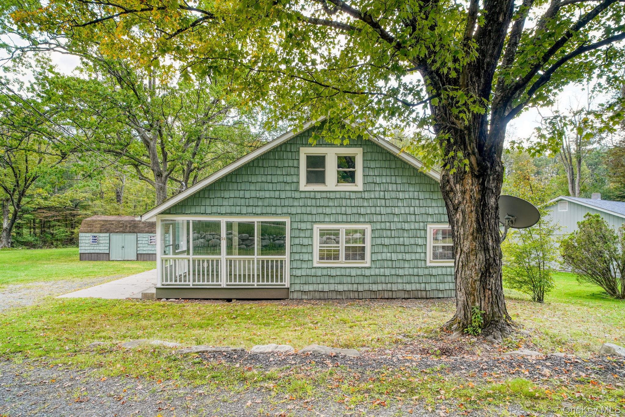 54 Lime Kiln Road Port Jervis, NY 12771 - Photo 2 of 34 a front view of a house with a yard
