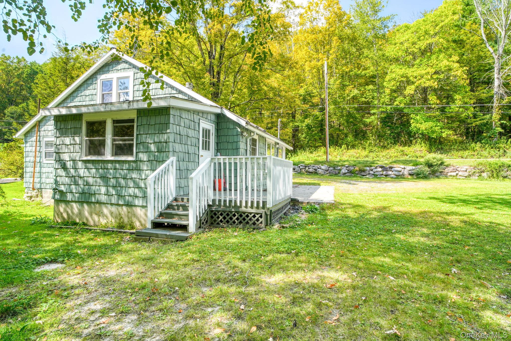 54 Lime Kiln Road Port Jervis, NY 12771 - Photo 30 of 34 a front view of a house with a yard