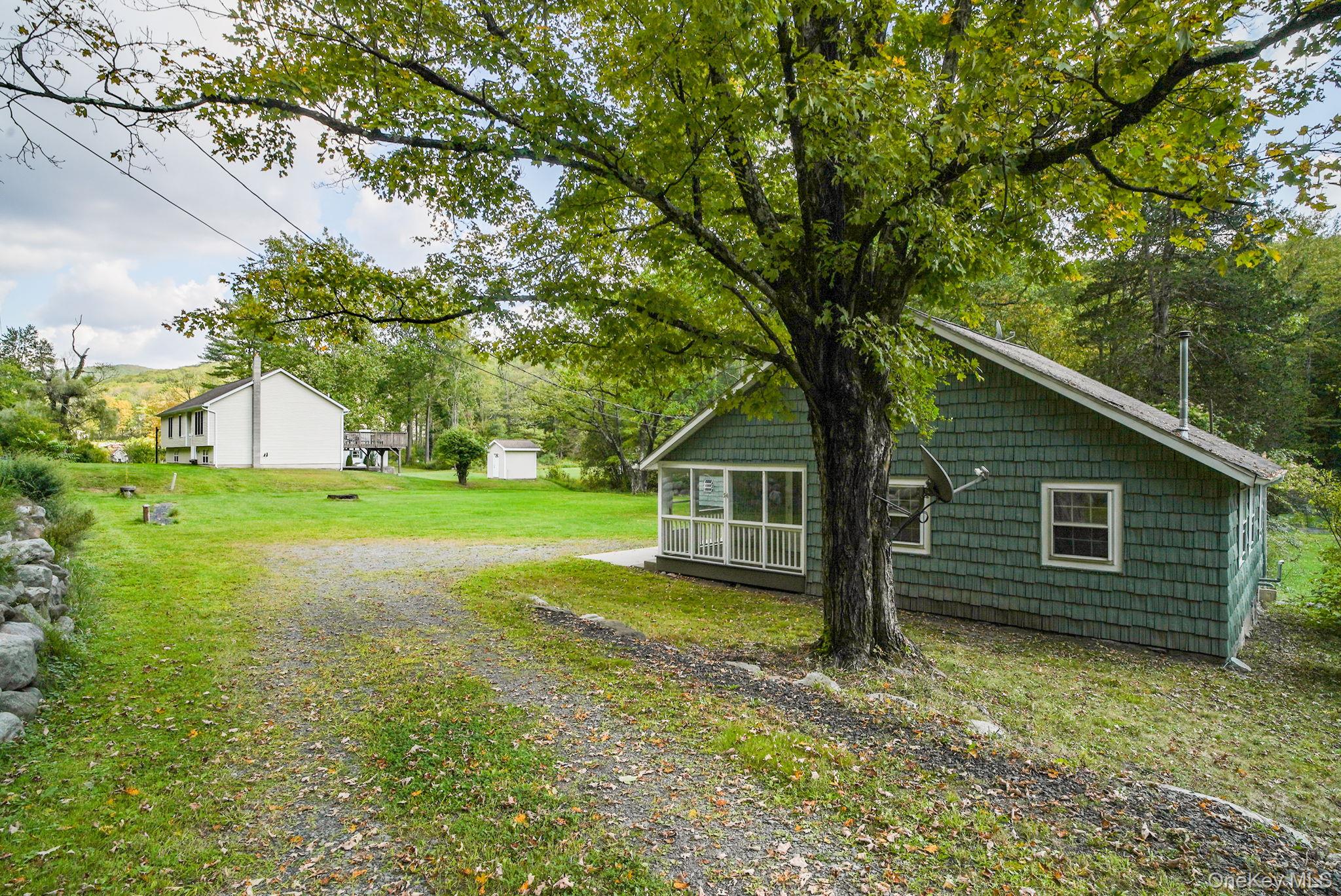54 Lime Kiln Road Port Jervis, NY 12771 - Photo 3 of 34 a view of a house with backyard and garden