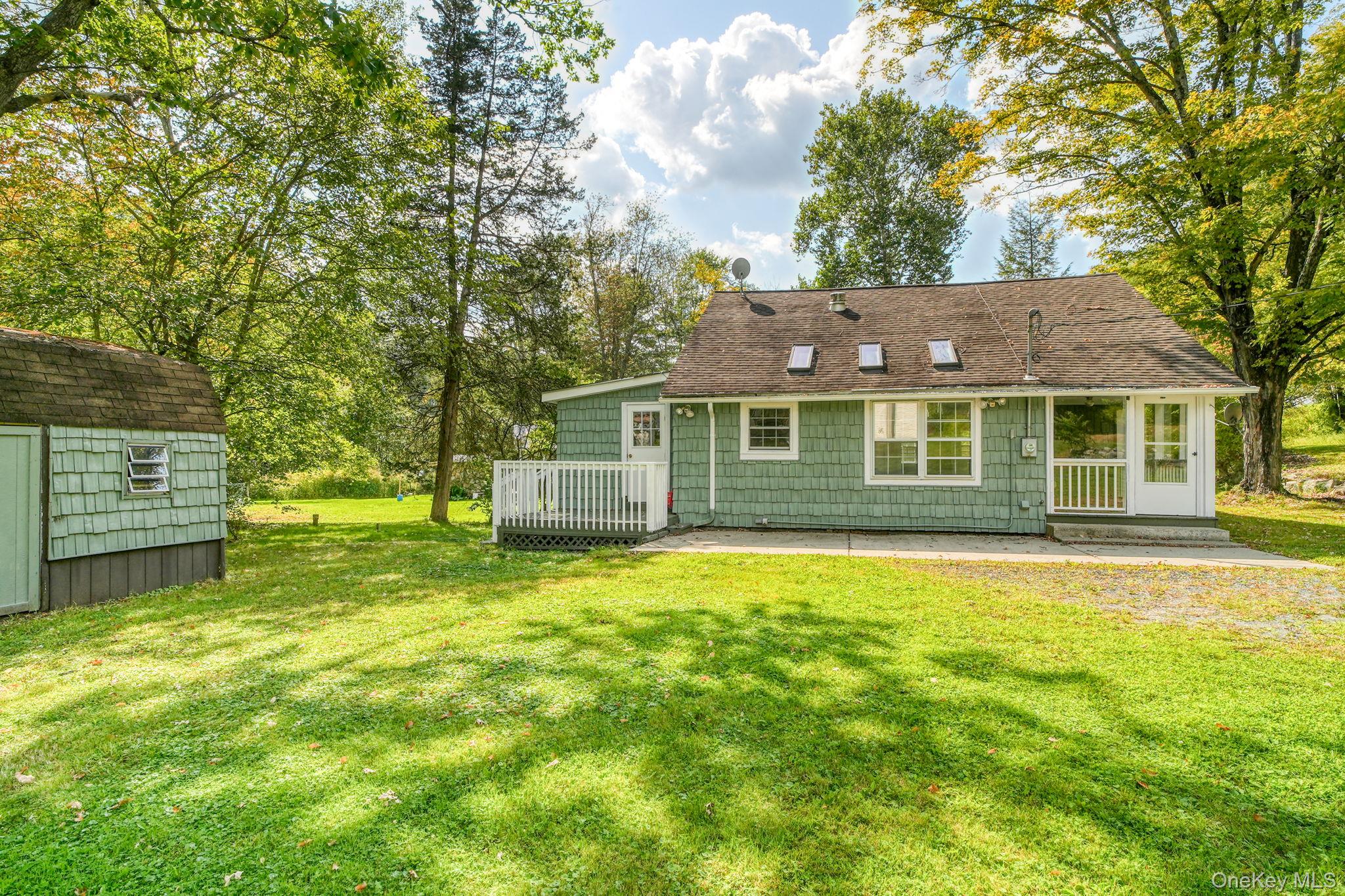 54 Lime Kiln Road Port Jervis, NY 12771 - Photo 33 of 34 a front view of a house with a yard