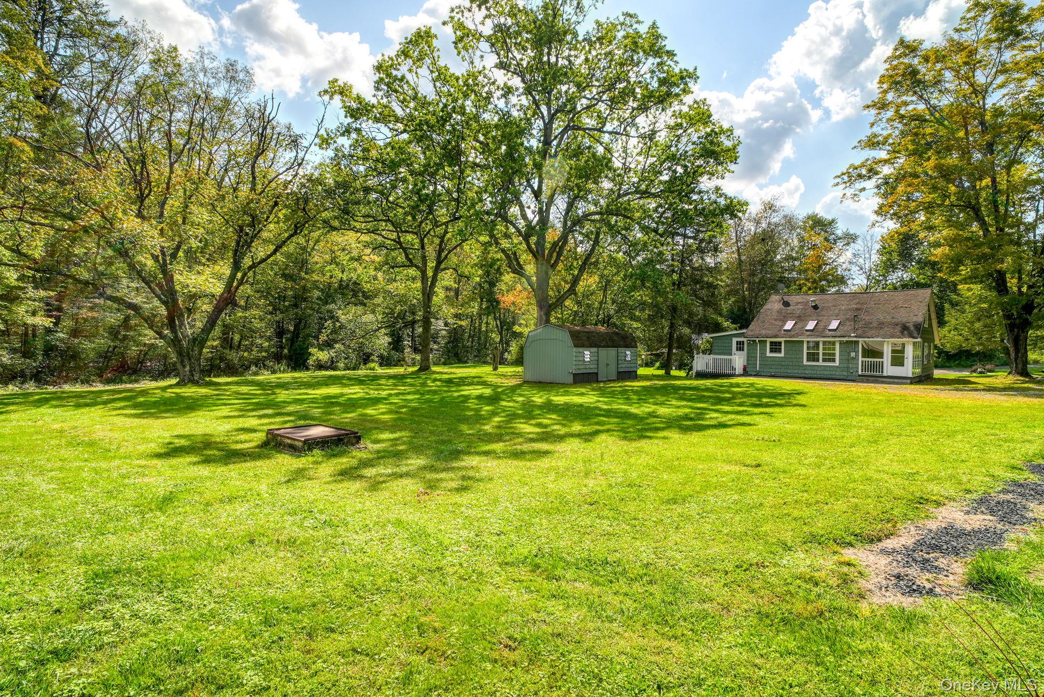 54 Lime Kiln Road Port Jervis, NY 12771 - Photo 34 of 34 a swimming pool with outdoor seating and yard
