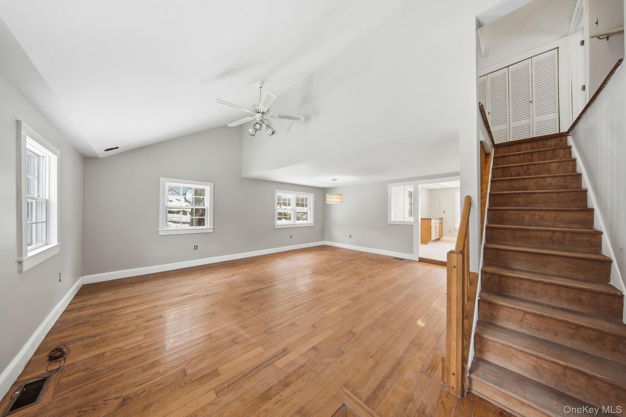 54 Lime Kiln Road Port Jervis, NY 12771 - Photo 7 of 34 a view of an empty room with wooden floor and a window