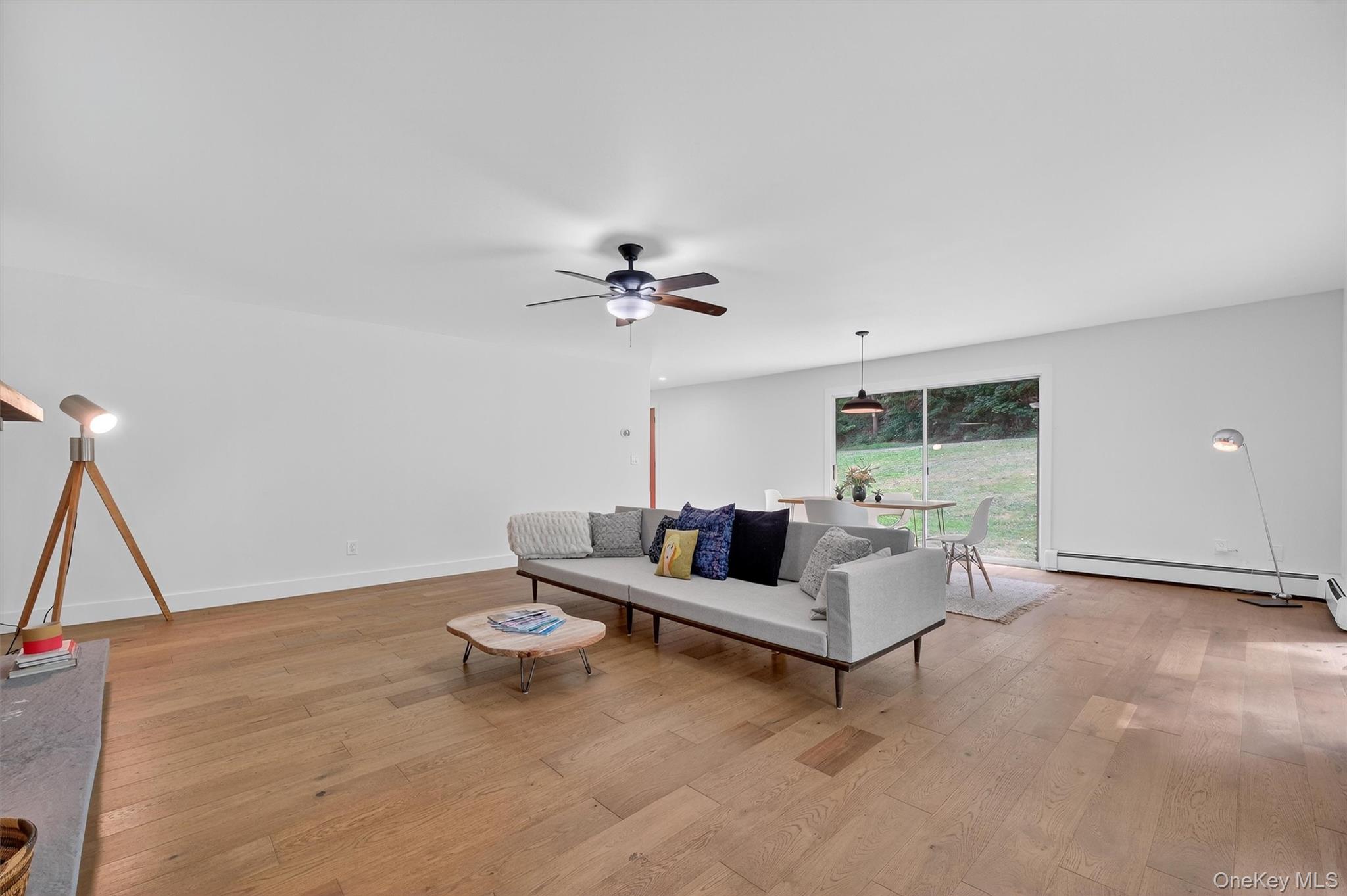 15 Fairview Road Beacon, NY 12508 - Photo 20 of 41 Living area featuring light wood-style floors and baseboard heating