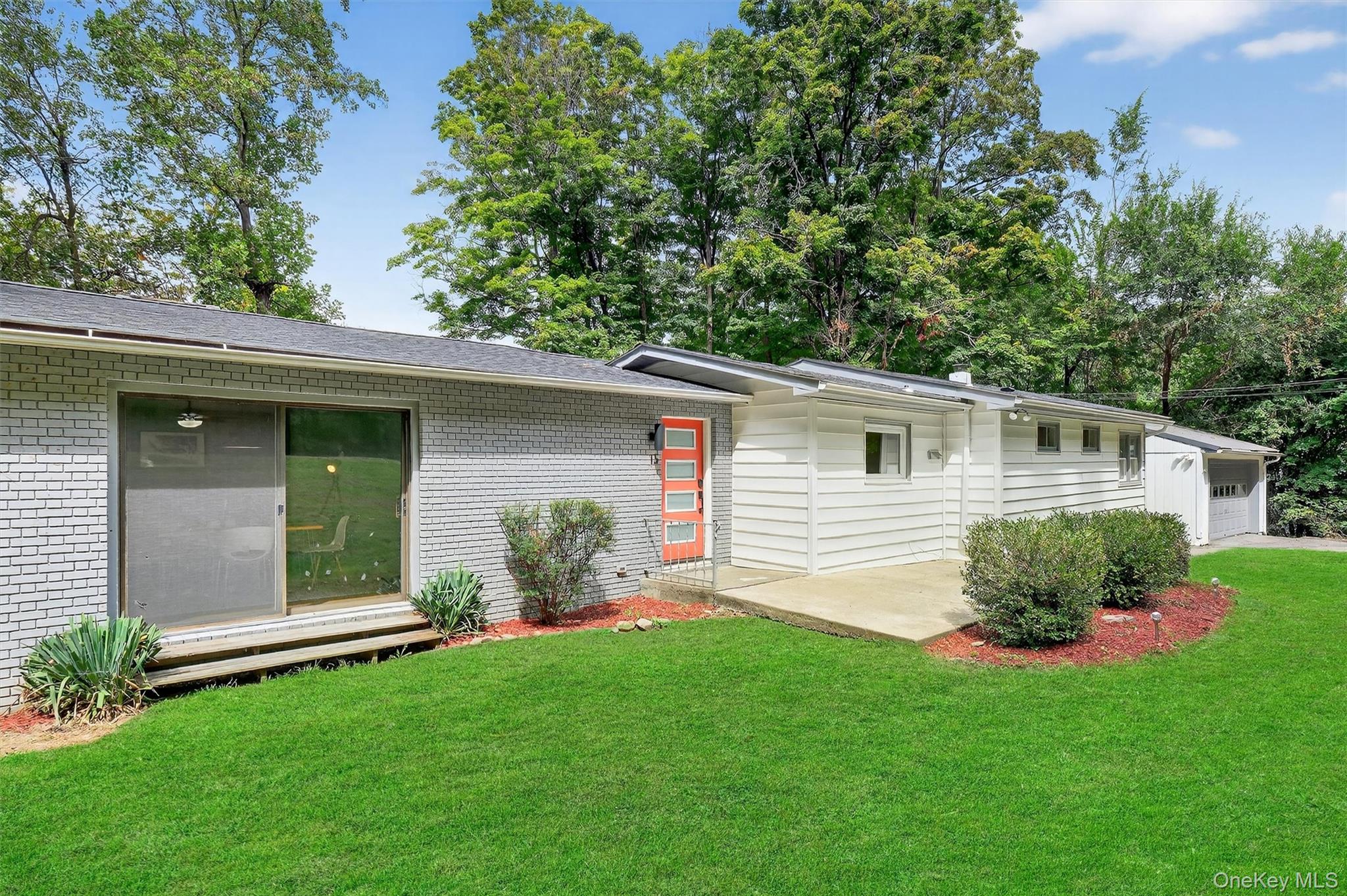 15 Fairview Road Beacon, NY 12508 - Photo 2 of 41 Ranch-style home featuring brick siding, a front lawn, an attached garage, and roof with shingles
