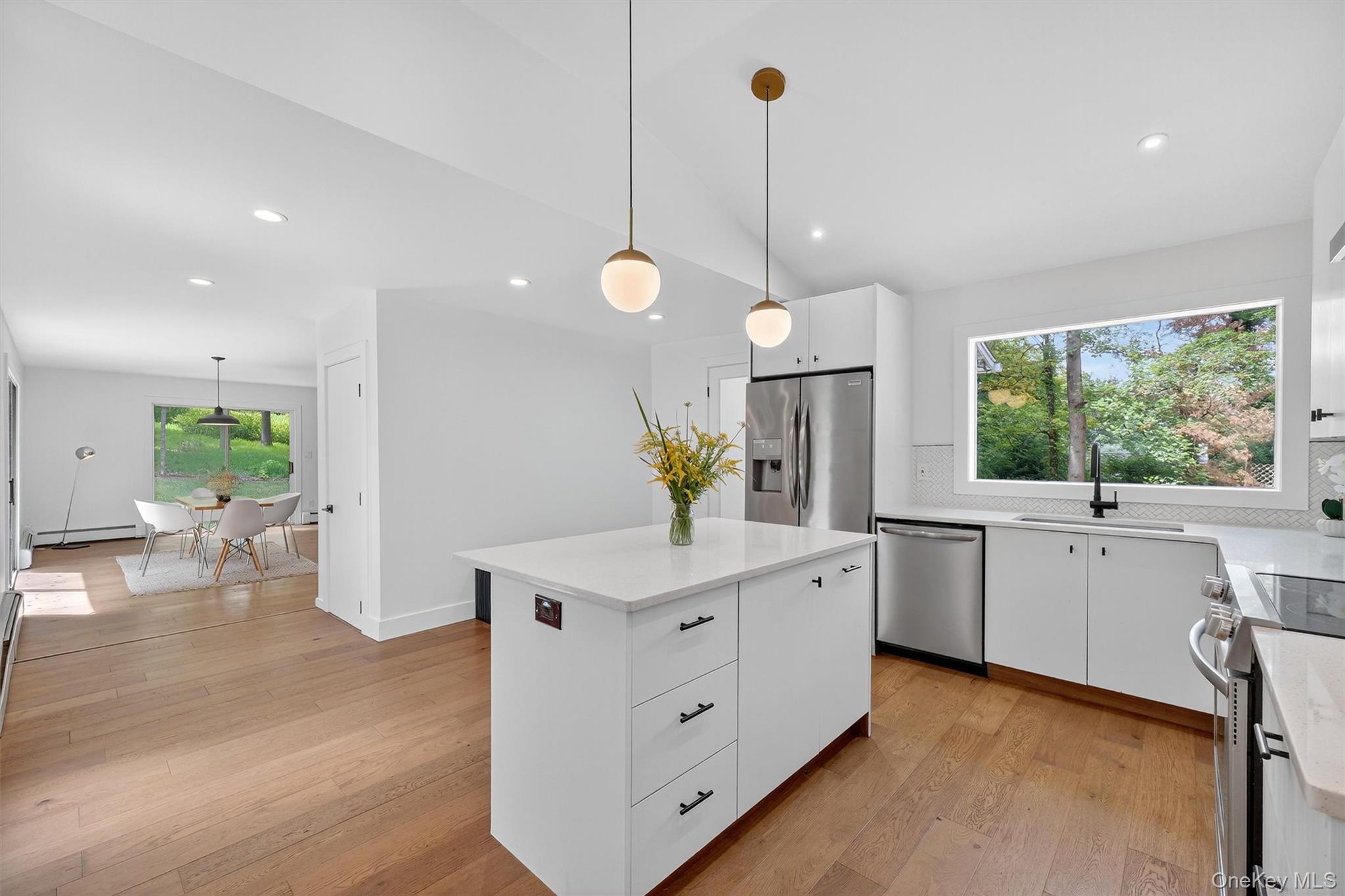 15 Fairview Road Beacon, NY 12508 - Photo 10 of 41 Kitchen featuring white cabinetry, pendant lighting, light wood-style floors, and recessed lighting