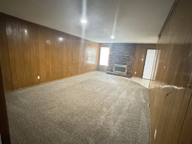 a stove top oven sitting inside of a kitchen