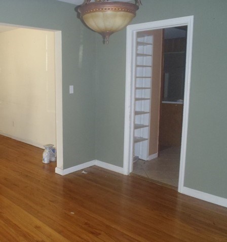 14 Artillery Drive Columbus, GA 31903 - Photo 3 of 9 an empty room with wooden floor and closet