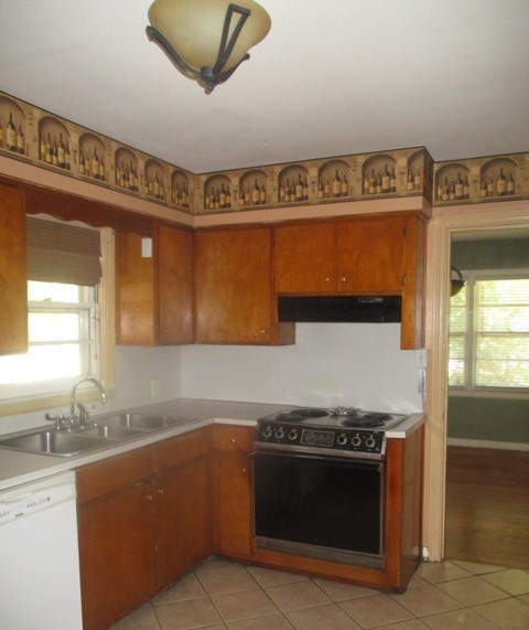 14 Artillery Drive Columbus, GA 31903 - Photo 4 of 9 a kitchen with stainless steel appliances granite countertop a stove and a sink