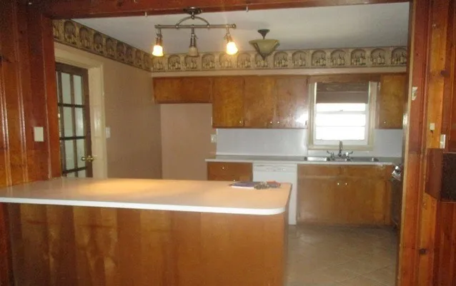a bathroom with a bathtub and a sink