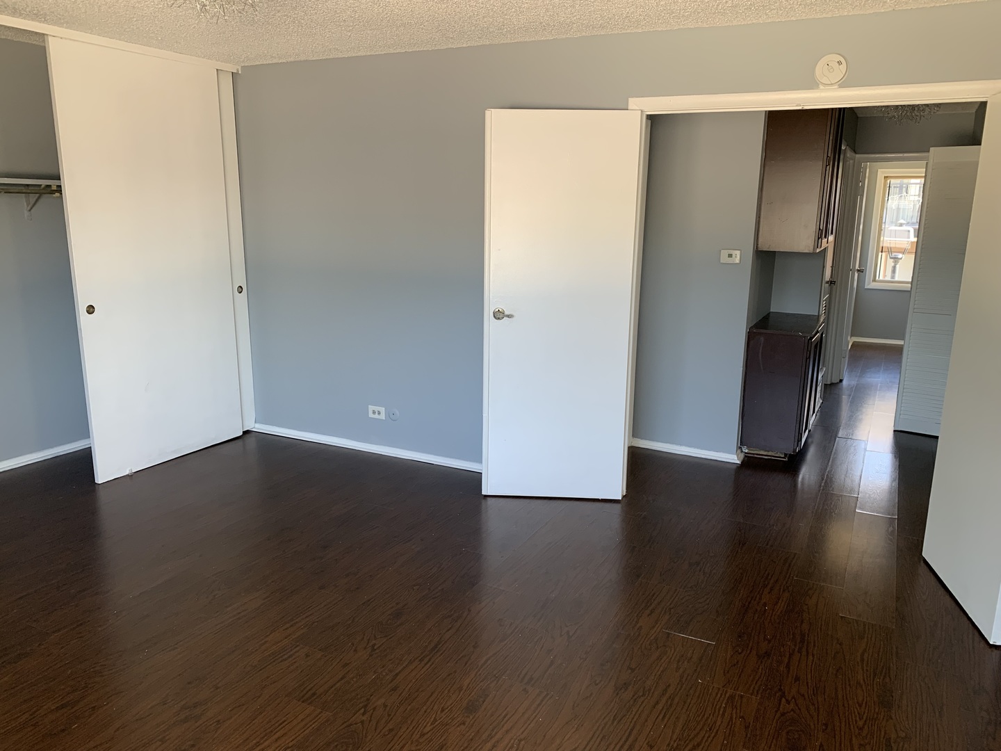 5573 Court F Hanover Park, IL 60133 - Photo 14 of 21 an empty room with wooden floor and closet
