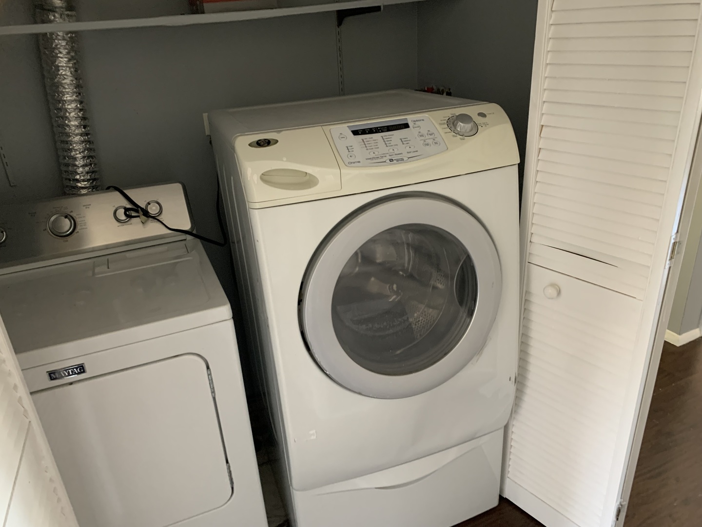 5573 Court F Hanover Park, IL 60133 - Photo 20 of 21 a utility room with dryer and washer