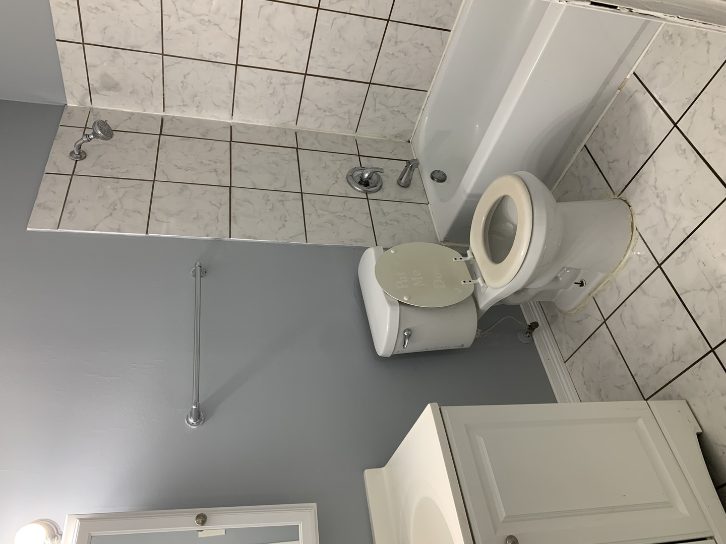 5573 Court F Hanover Park, IL 60133 - Photo 21 of 21 a bathroom with a sink toilet and shower