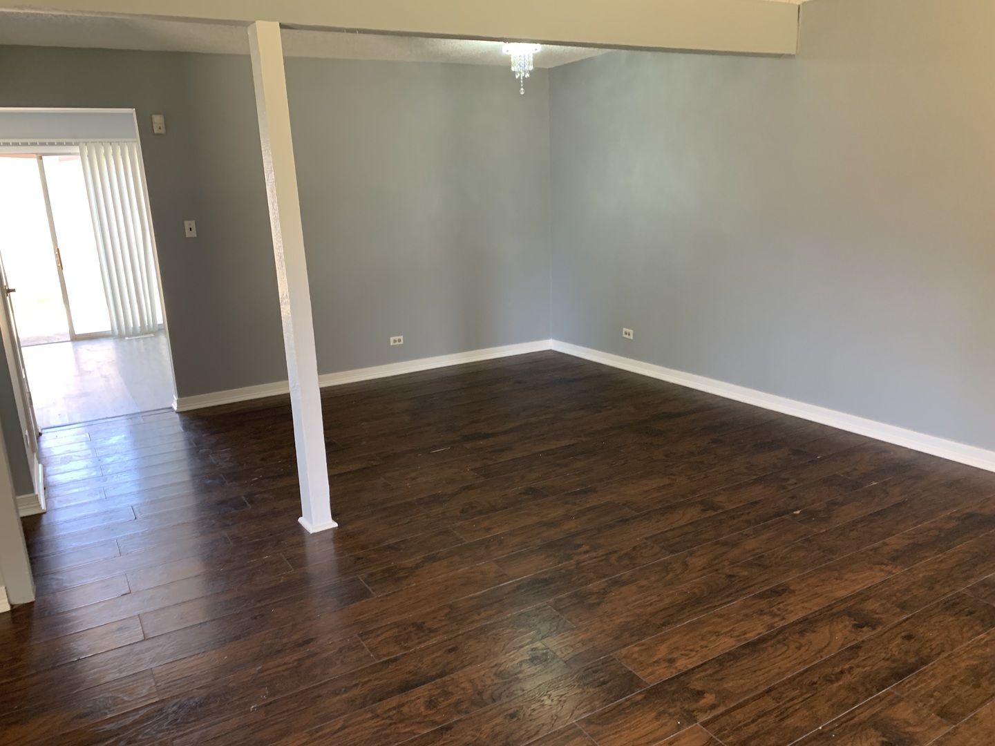 5573 Court F Hanover Park, IL 60133 - Photo 6 of 21 a view of a small space with wooden floor