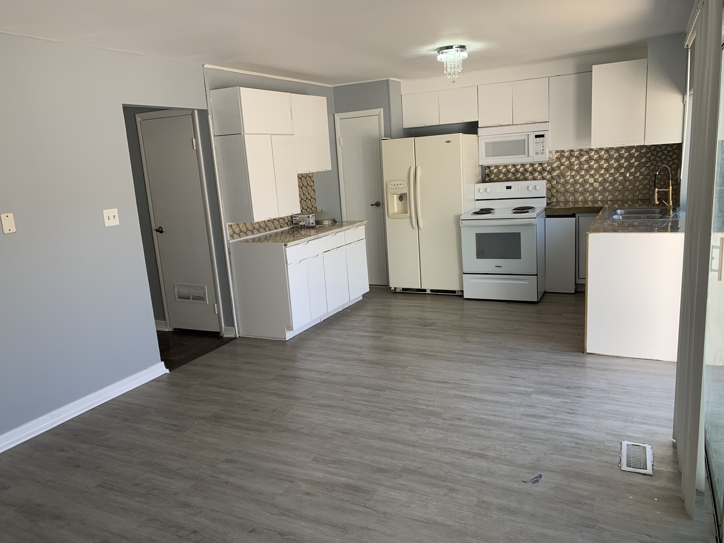 5573 Court F Hanover Park, IL 60133 - Photo 10 of 21 a kitchen with stainless steel appliances a refrigerator and a stove
