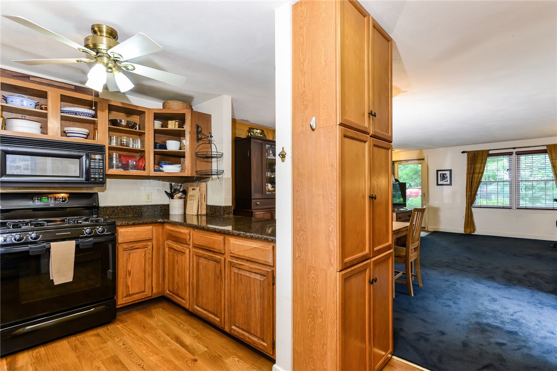 1175 Diamond Hill Road, Unit 105 Woonsocket, RI 02895 - Photo 14 of 28 Kitchen to living room view