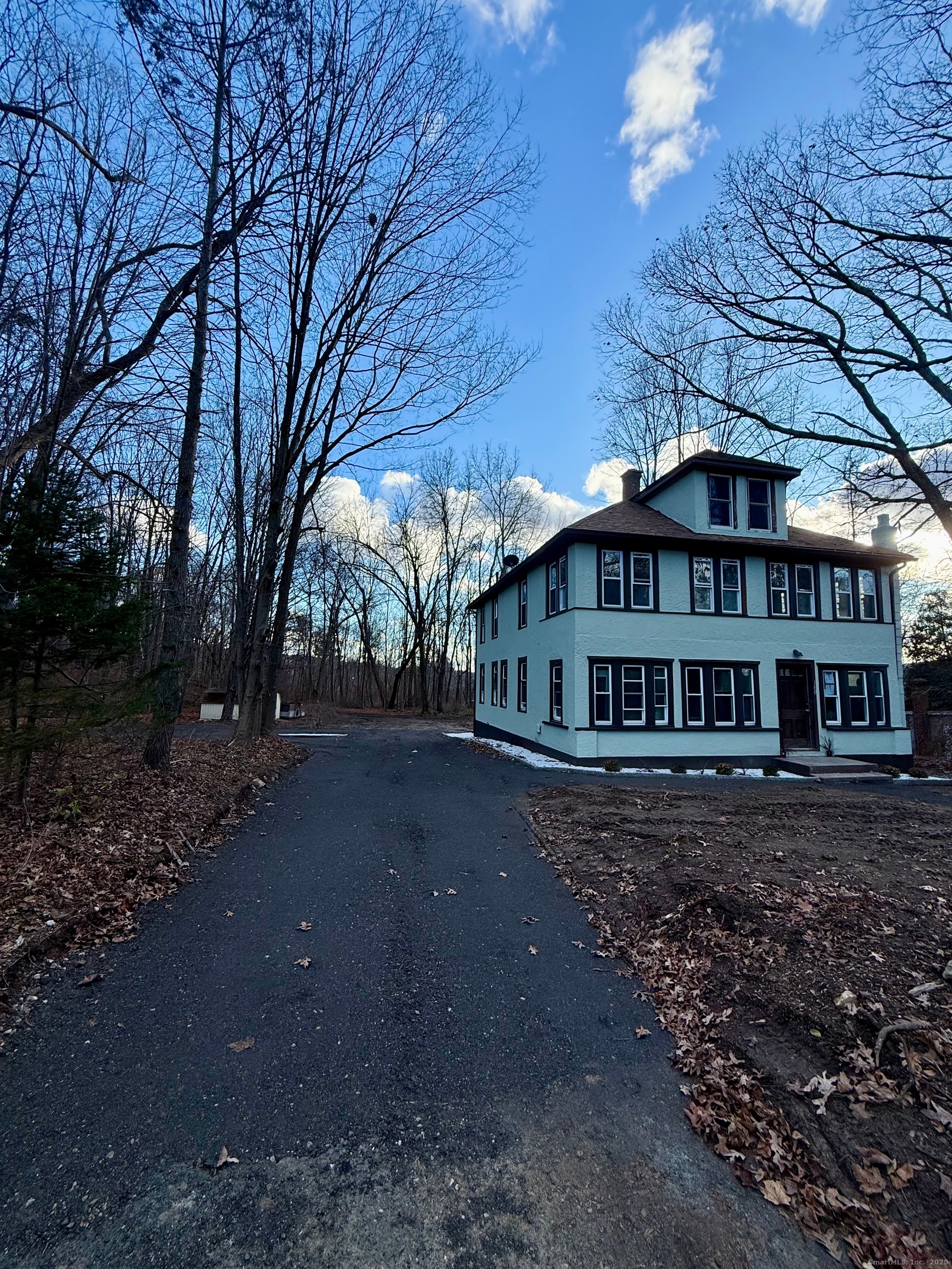 160 Laurel Hill Road Torrington, CT 06790 - Photo 6 of 8 a view of a big house with a big yard