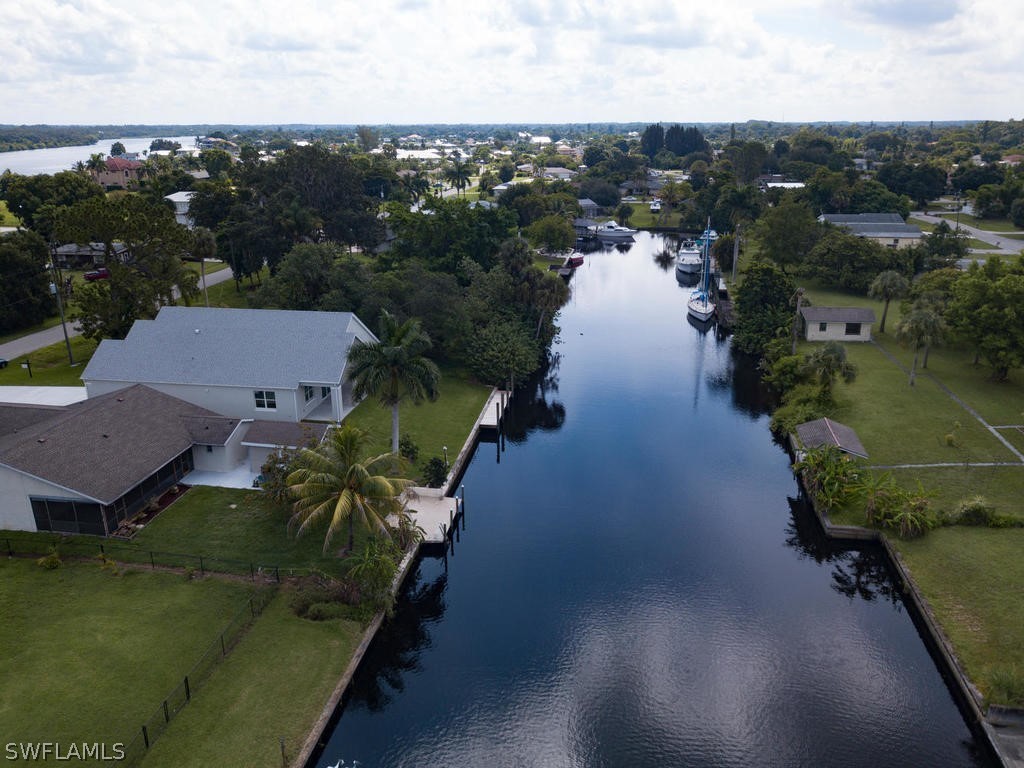 12523 River Road Fort Myers, FL 33905 - Photo 21 of 24 an aerial view of a house with outdoor space and lake view