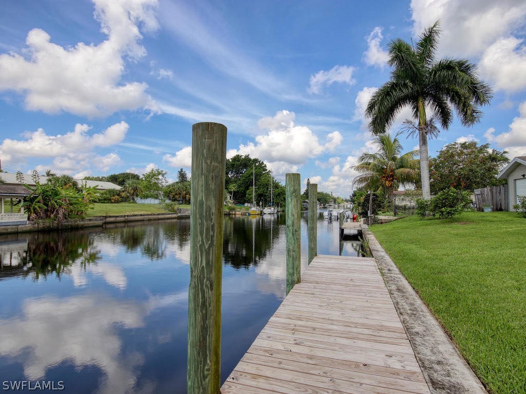12523 River Road Fort Myers, FL 33905 - Photo 7 of 24 a lake view with a garden