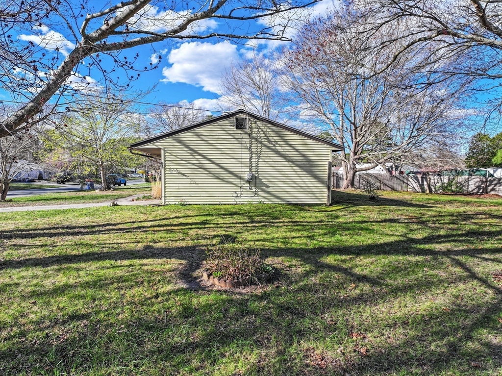 12 Parker Drive Wareham, MA 02571 - Photo 21 of 32 a view of a house with a yard