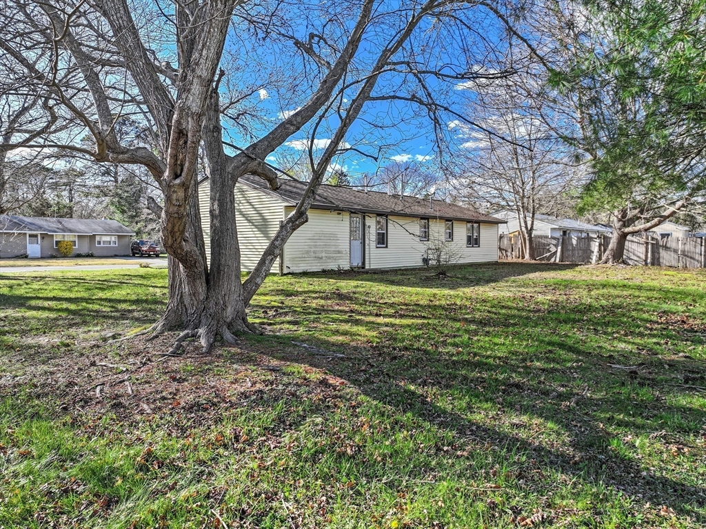 12 Parker Drive Wareham, MA 02571 - Photo 22 of 32 a view of a house with a yard
