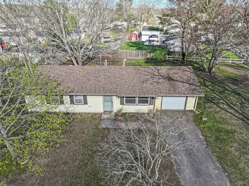 12 Parker Drive Wareham, MA 02571 - Photo 27 of 32 a front view of a house with a yard and large tree