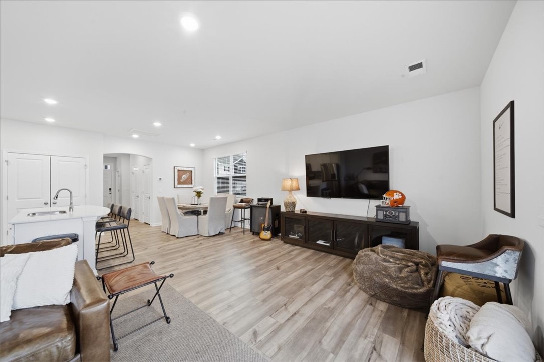 455 Bee Cv Way Pendleton, SC 29670 - Photo 16 of 46 This bright and airy living space offers an open layout, ideal for modern living and entertaining.