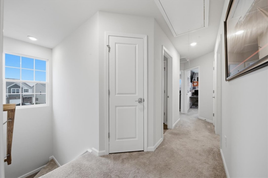 455 Bee Cv Way Pendleton, SC 29670 - Photo 26 of 46 Bright hallway with ample lighting and inviting views awaits.