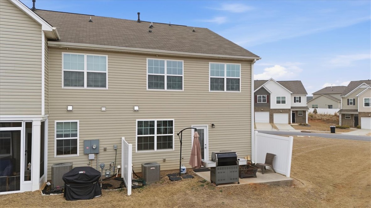 455 Bee Cv Way Pendleton, SC 29670 - Photo 32 of 46 This residence features a patio for outdoor enjoyment, complemented by durable vinyl siding.