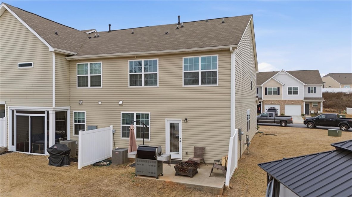 455 Bee Cv Way Pendleton, SC 29670 - Photo 33 of 46 This townhome features a private patio, screened porch, and a well-maintained exterior.