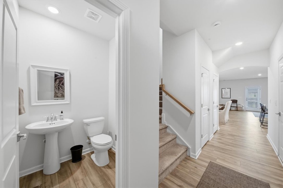 455 Bee Cv Way Pendleton, SC 29670 - Photo 4 of 46 This clean and bright space features a convenient powder room and inviting entryway with stairs.