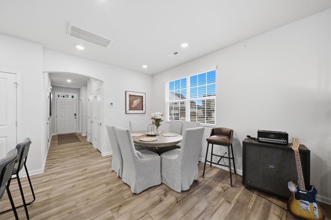 455 Bee Cv Way Pendleton, SC 29670 - Photo 6 of 46 This bright dining area features an open layout and beautiful wood flooring.
