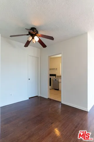 a view of a livingroom with wooden floor